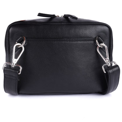 Black leather crossbody bag with silver hardware on a white background