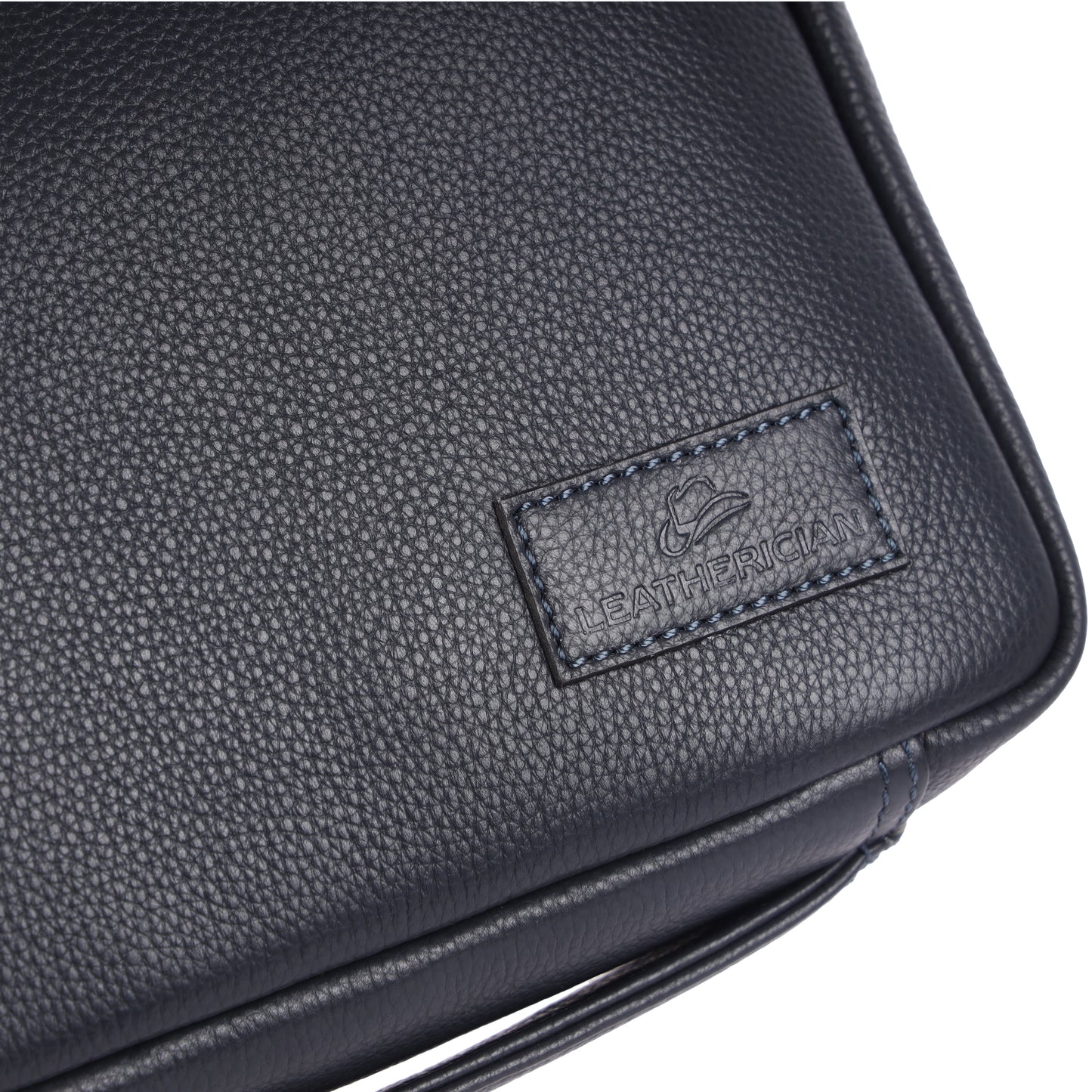 Black leather bag with a visible brand logo on a white background
