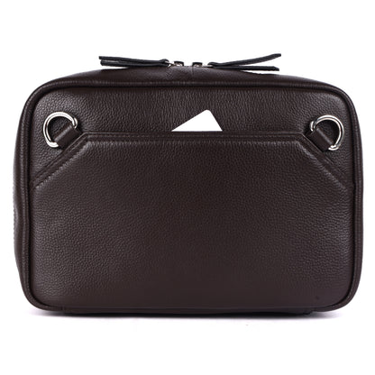 Brown leather bag with silver hardware on a white background