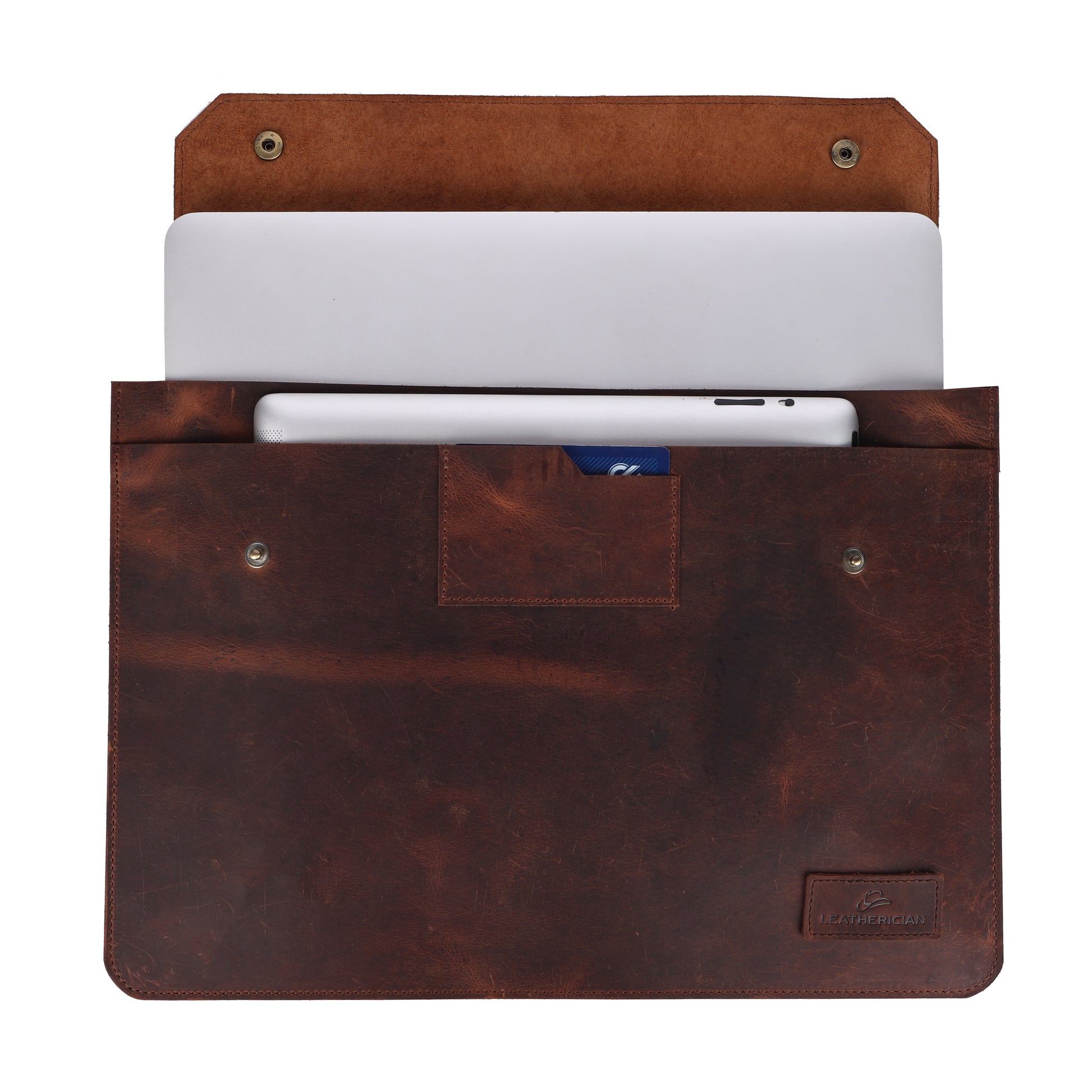 Brown leather sleeve with a laptop and phone inside on a white background