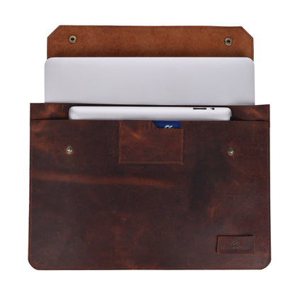 Brown leather sleeve with a laptop and phone inside on a white background