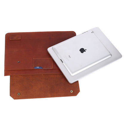 Brown leather sleeve with an Apple device on a white background