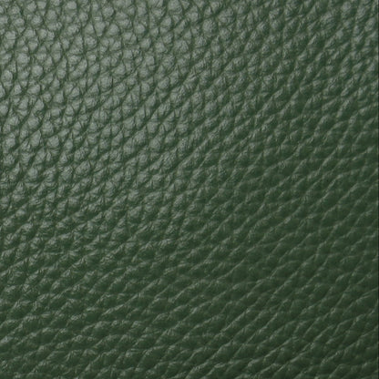 Green leather bag with a brand logo on a white background