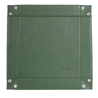 Green leather-bound notebook with silver rivets on a white background
